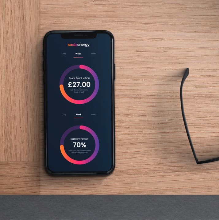 Smartphone displaying solar and battery energy data for renewable energy management.