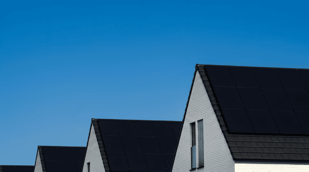Solar panels on residential roof for renewable energy.