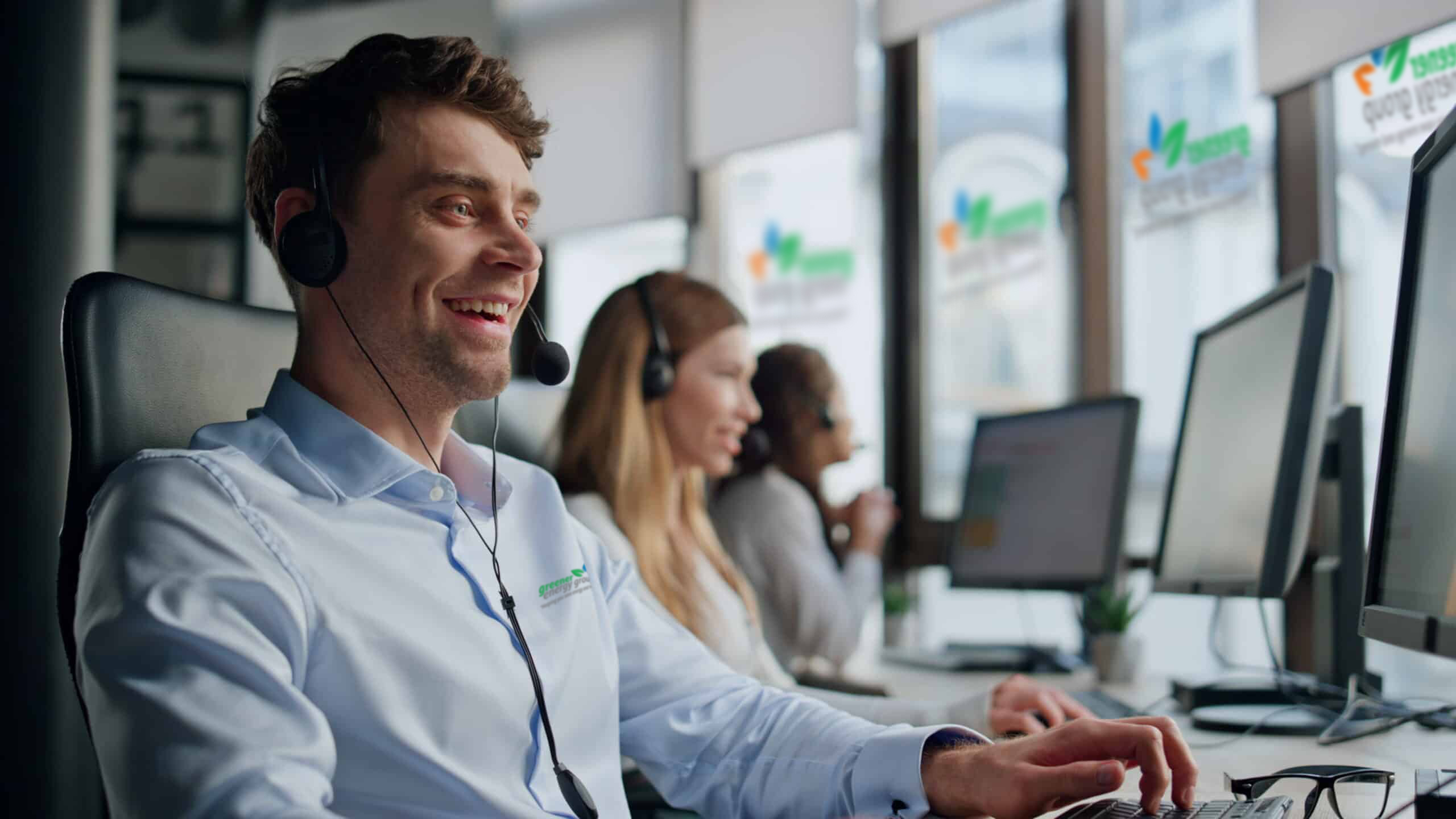Octopus Cosy Heat Pumps 10 Customer support team at Green Energy Group call centre with headsets.